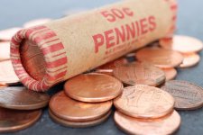 rolls-pennies-against-dark-background-coin-wrappers-n-f-string-son-inc-us-based-manufacturer-c...jpg